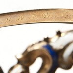 Detail of gold bracelet inscription