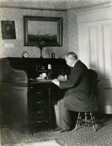 Calvin A. Frye at his desk, P00724