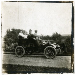 Joseph Mann driving the Yale touring car with Minnie Scott, Janet Colman, and Minnie Weygandt—who later wrote about her memories of the Yale—in the back seat on the left. P01850.