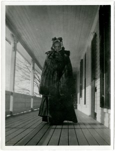 Photograph by Calvin Frye of Mary Baker Eddy on one of the verandas of her home, Pleasant View.