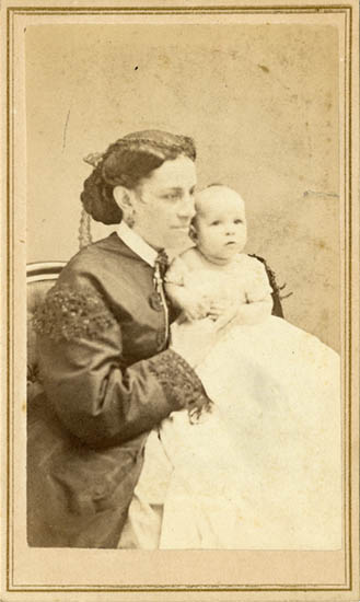 Studio portrait of Susan Oliver with a child