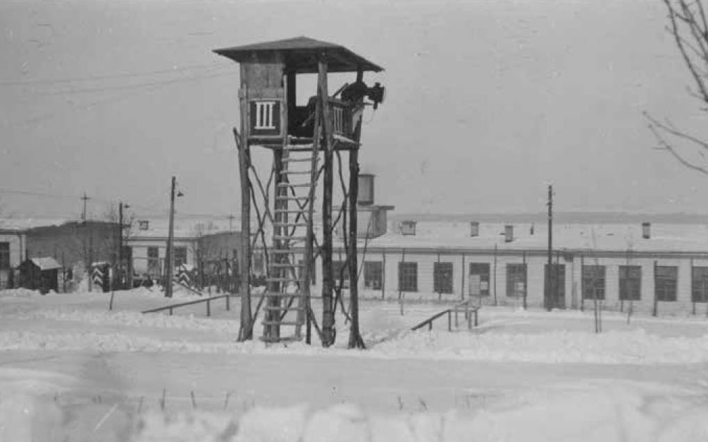 Image of one of the watchtowers where the soldiers overlooked the barbed wire fence around the camp. They were equipped with searchlights and machine guns to prevent escapes from the STALAG. Circa 1942. Courtesy of Documentation centre of Austrian resistance, DÖW.