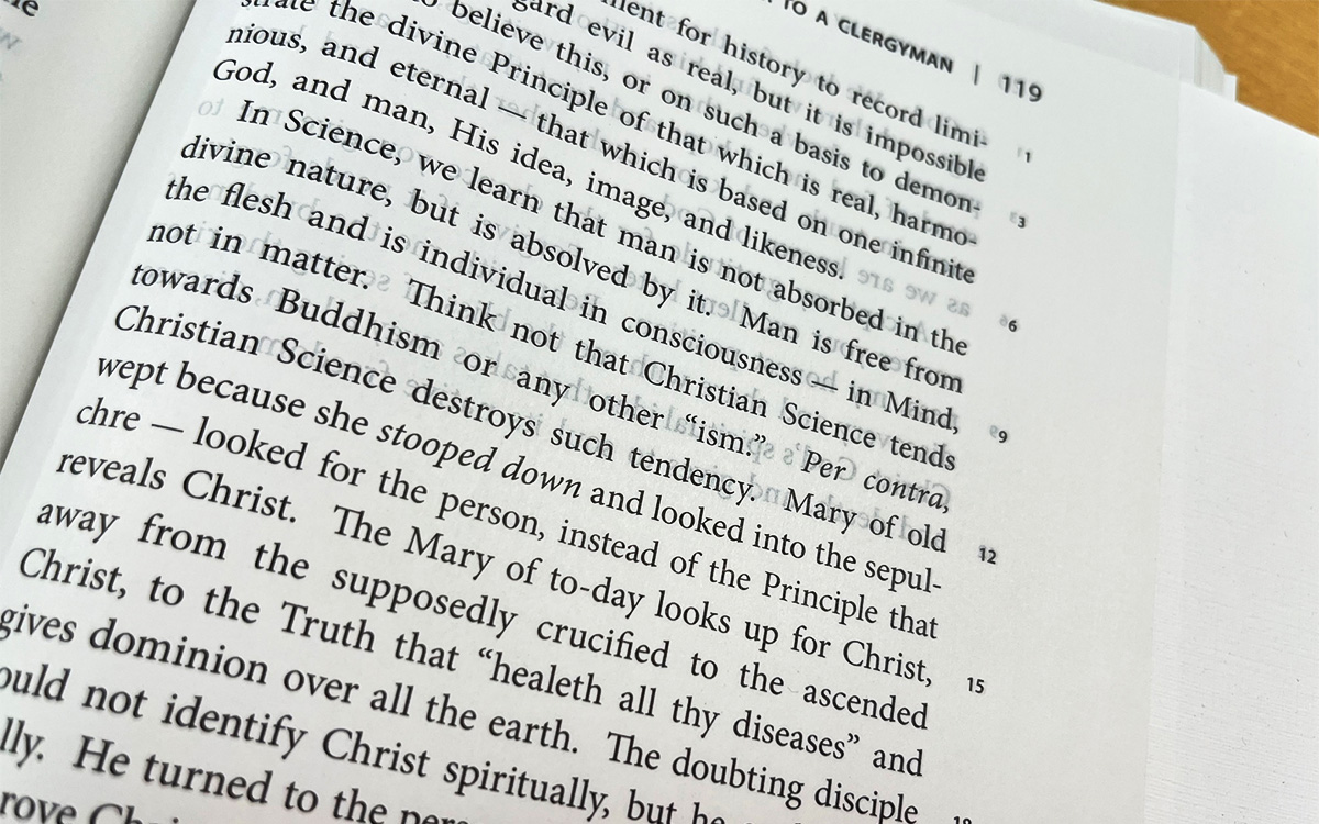 Photograph of page 119 of Science and Health with Key to the Scriptures, including the sentence, "Think not that Christian Science tends towards Buddhism or any other 'ism.'"